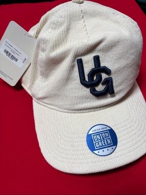 Union Green bone & navy cap. NWT!!